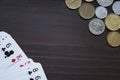 Coins and playing cards topview background Royalty Free Stock Photo