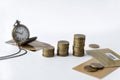 coins, pocket watch on chain, multiple Bank cards on white background, time, money Royalty Free Stock Photo