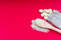 Coins and rice on red background. Zakat concept.