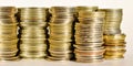 Coins stacked in bars. The concept of revenue growth Royalty Free Stock Photo