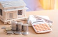 Coins stacked savings, calculator,notebook