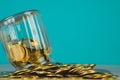 Coins stacks and gold coin money in the glass jar on table with Royalty Free Stock Photo