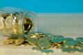 Coins stacks and gold coin money in the glass jar on table with Royalty Free Stock Photo
