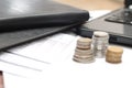 Coins on the table, with laptops and financial reports, version 2 Royalty Free Stock Photo