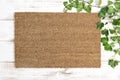 Coir doormat Floral template mockup wooden background Royalty Free Stock Photo