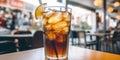 Coke glass with ice and lemon on a table Royalty Free Stock Photo