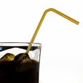 Coke glass with orange straw Royalty Free Stock Photo