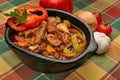 Coked pork meat with peppers