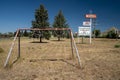 Swingset and playground at an old abandoned seedy motel