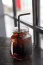 Cola drinking on wooden table