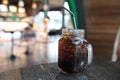 Cola drinking on wooden table