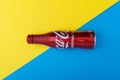 Cola or coke drink on a blue and yellow background