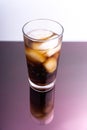 Cola - cola and ice cubes in glass on white background Royalty Free Stock Photo