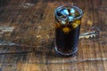 Cola drink, black soft drinks in a glass on the table Royalty Free Stock Photo