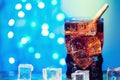 Cola in drinking glass with ice cube sweet sparkling carbonated drink beverage fast food with big calorie Royalty Free Stock Photo