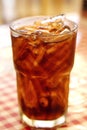 Cola in drinking glass with ice. Royalty Free Stock Photo