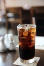 Cola drinking on wooden table