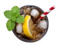 Cola with ice cubes and yellow lemon sliced in glass top view isolated on white, clipping path