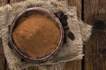 Cola Nut Powder on wooden background Royalty Free Stock Photo