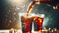 cola soft drink flowing from two cups into glasses, with the stream of liquid creating an arc Royalty Free Stock Photo