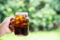 Cola cola sparkling water in a glass with ice Royalty Free Stock Photo