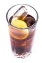 Cola in tall glass with ice cubes and lime