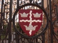 Colchester shield sign emblem on gates red and black town park