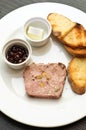 Cold appetizer with duck terrine and cherry sauce Royalty Free Stock Photo