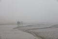 Fog, People and Sandy Beach in New England Royalty Free Stock Photo