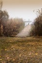 Cold autumn foggy morning near a beautiful fishing lake in Sic