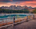 Cold autumn morning on Karersee lake, Province of Bolzano - South Tyrol.