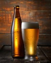 Cold beer in glass and bottle on a dark wooden background Royalty Free Stock Photo