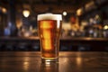 Cold Beer in Glass on Wooden Bar Counter Royalty Free Stock Photo