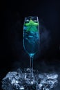 Cold blue cocktail with a star fruit garish