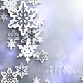 Cold blue sparkling Christmas background with snowflakes