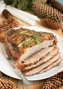 Cold boiled pork is a traditional Russian, Austrian or German dish of meat with spices and garlic. Christmas decoration, rustic st