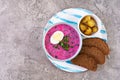 Cold borscht on wooden background. Cold beet soup. Top view Royalty Free Stock Photo