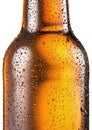 Cold bottle of beer with condensated water drops on it. Royalty Free Stock Photo