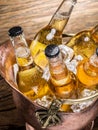 Cold bottles of beer in the brazen bucket. Royalty Free Stock Photo