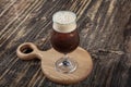 Cold brew coffee.Tasty ice coffee with milk , cold drink in glass on wooden background. Copy space