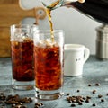 Cold brew iced coffee in tall glasses Royalty Free Stock Photo