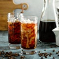 Cold brew iced coffee in tall glasses Royalty Free Stock Photo