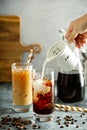 Cold brew iced coffee in tall glasses Royalty Free Stock Photo