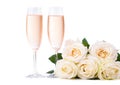 Cold champagne and a bouquet of roses Royalty Free Stock Photo