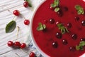 Cold cherry soup in a bowl on a table close-up. Horizontal top v Royalty Free Stock Photo