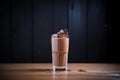 cold chocolate milk in a glass with ice cubes Royalty Free Stock Photo