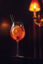 cold cocktail aperol spritz on a dark background