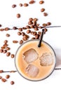 cold coffee glass with ice cubes on white table background top view Royalty Free Stock Photo