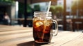 Cold coffee in a glass jar: refreshing on a hot day Royalty Free Stock Photo