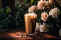 cold coffee near flowers background